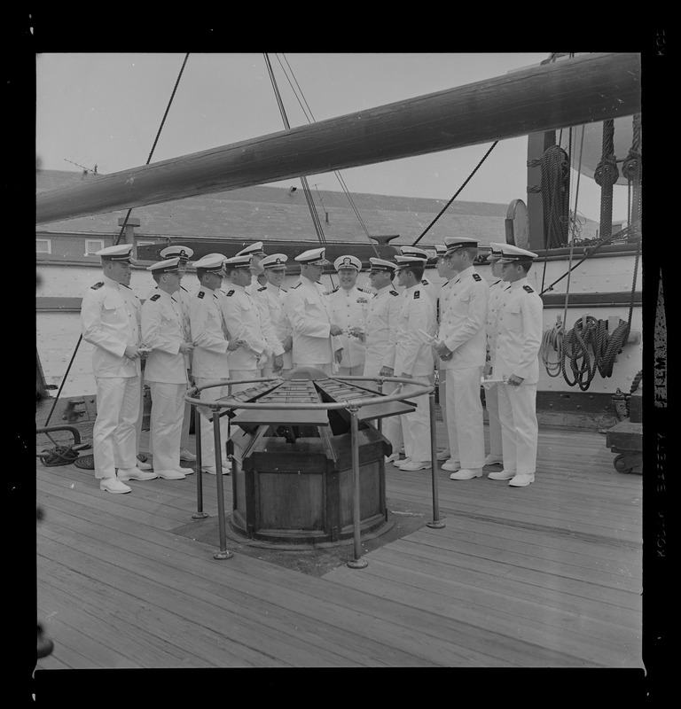 Rear Admiral Joseph C. Wylie with 16 Tufts ROTC graduates