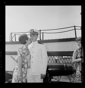 Tufts Naval ROTC graduate receives kiss at commissioning ceremony aboard Old Ironsides