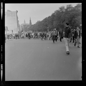 Demonstration marching along Charles St. towards Massachusetts State House to protest plan to move UMass Boston to Columbia Point
