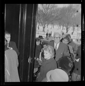 Jane Spock and Dr. Benjamin Spock entering Arlington Street Church for anti-draft rally