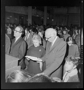 William Sloane Coffin, Jane Spock, and Dr. Benjamin Spock at anti-draft rally at Arlington Street Church