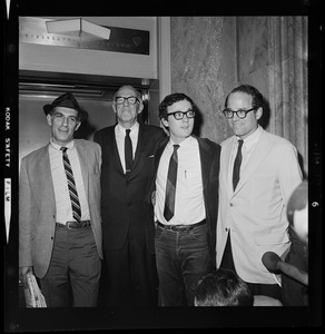 Smiling for newsmen shortly after they were found guilty of anti-draft conspiracy charges are, from left, author-teacher Mitchell Goodman, pediatrician Dr. Benjamin Spock, Harvard graduate student Michael Ferber, and Yale University Chaplain William Sloane Coffin, Jr.