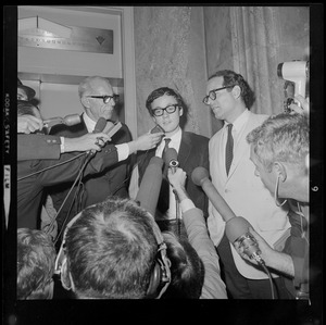 Pediatrician Dr. Benjamin Spock, Harvard graduate student Michael Ferber, and Yale University Chaplain William Sloane Coffin, Jr., shortly after they were found guilty of anti-draft conspiracy charges in "Boston Five" trial