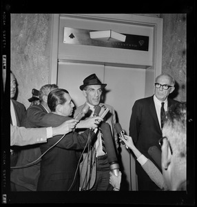 Author-teacher Mitchell Goodman and pediatrician Dr. Benjamin Spock shortly after they were found guilty of anti-draft conspiracy charges in "Boston Five" trial