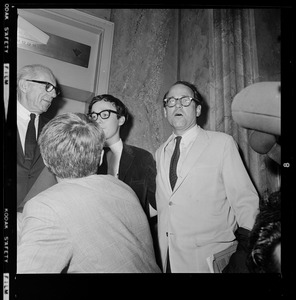 Pediatrician Dr. Benjamin Spock, Harvard graduate student Michael Ferber, and Yale University Chaplain William Sloane Coffin, Jr., shortly after they were found guilty of anti-draft conspiracy charges in "Boston Five" trial