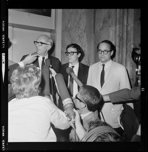 Pediatrician Dr. Benjamin Spock, Harvard graduate student Michael Ferber, and Yale University Chaplain William Sloane Coffin, Jr., shortly after they were found guilty of anti-draft conspiracy charges in "Boston Five" trial