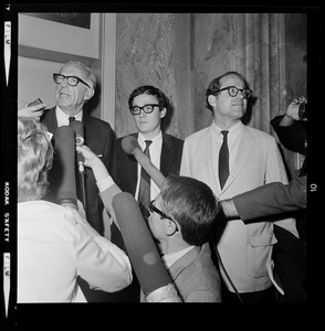 Pediatrician Dr. Benjamin Spock, Harvard graduate student Michael Ferber, and Yale University Chaplain William Sloane Coffin, Jr., shortly after they were found guilty of anti-draft conspiracy charges in "Boston Five" trial