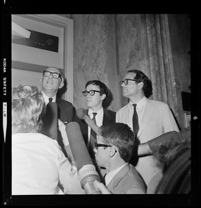 Pediatrician Dr. Benjamin Spock, Harvard graduate student Michael Ferber, and Yale University Chaplain William Sloane Coffin, Jr., shortly after they were found guilty of anti-draft conspiracy charges in "Boston Five" trial