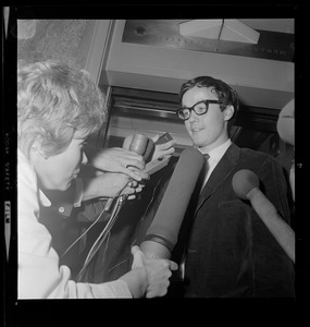 Harvard graduate student Michael Ferber talking with reporters after being found guilty of anti-draft conspiracy charges in "Boston Five" trial