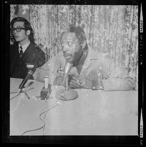 Dick Gregory at press conference at Northeastern University