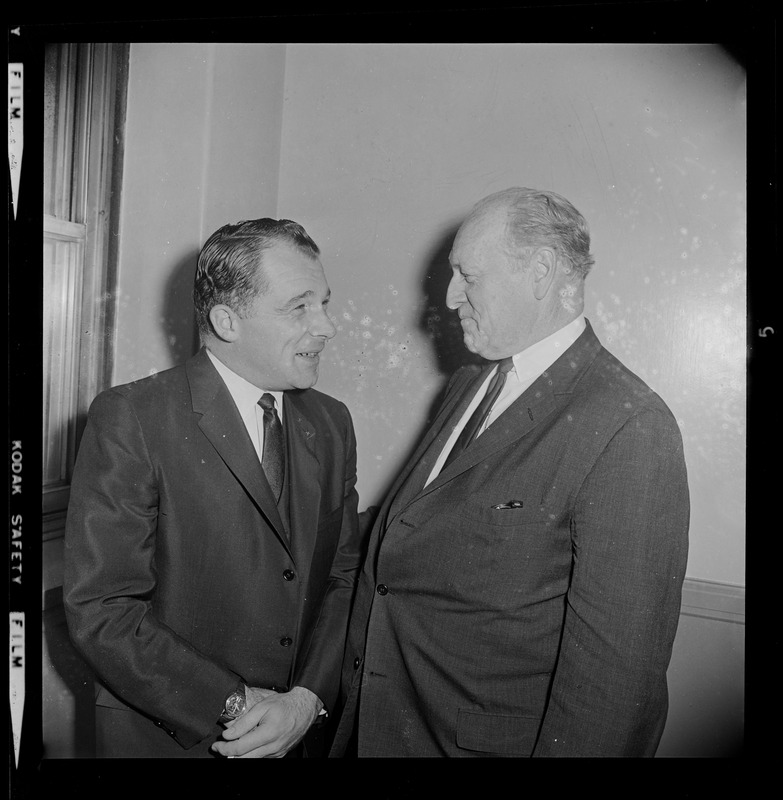 F. Lee Bailey (left) in conference with his client John J. Kelly of Watertown, at Federal Court