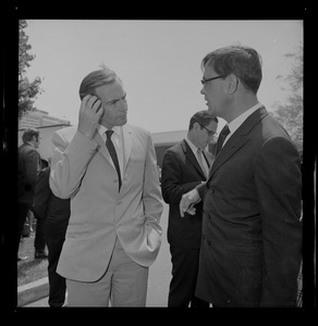 Dr. Christiaan Barnard speaking with unidentified man at Boston Museum of Science