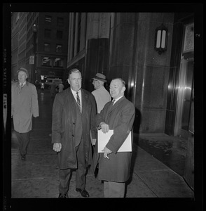 Unidentified men outside the Federal Building in Boston