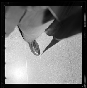 Shoe and floor, possibly in the Federal Building in Boston