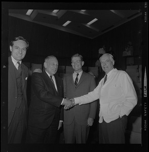 Unidentified man, Judge Robert Gardiner Wilson, Jr., chairman of the Board of Governors of the Boston Burns Institute, Dr. Paul Russell, Chief Surgeon of Mass. General Hospital, and Dr. Oliver Cope, Chief of Staff of the same hospital and the new Burns Institute, join in the dedication of the Institute's new auditorium