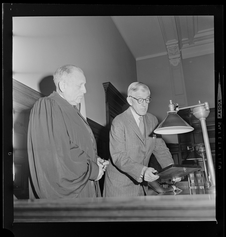 Sen. Leverett Saltonstall presenting Judge Robert G. Wilson with plaque