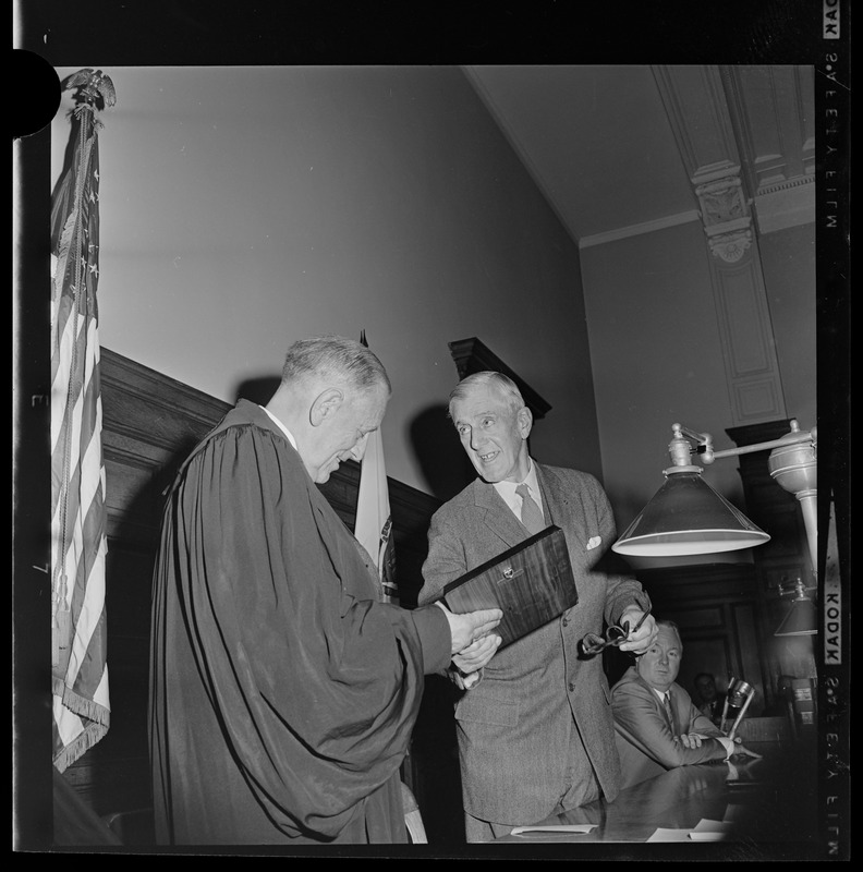 Sen. Leverett Saltonstall presenting Judge Robert G. Wilson with plaque