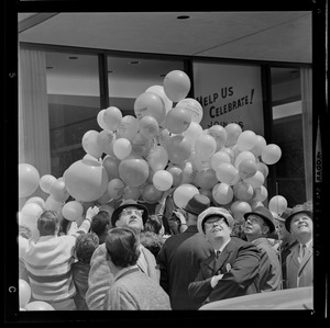 People with balloons at dedication of State Street Bank Building