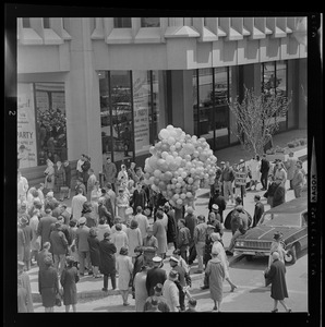 People with balloons at dedication of State Street Bank Building