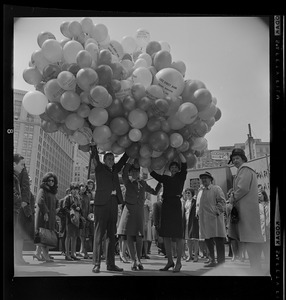 People with balloons at dedication of State Street Bank Building