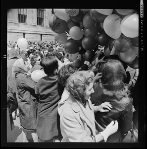 People with balloons at dedication of State Street Bank Building