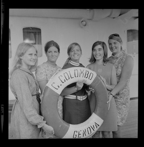 Five unidentified women holding a life preserver reading "C. Colombo Genova"
