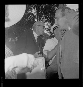 Dr. Benjamin Spock and Mitchell Goodman of the "Boston Five" at anti-draft rally in Boston Common