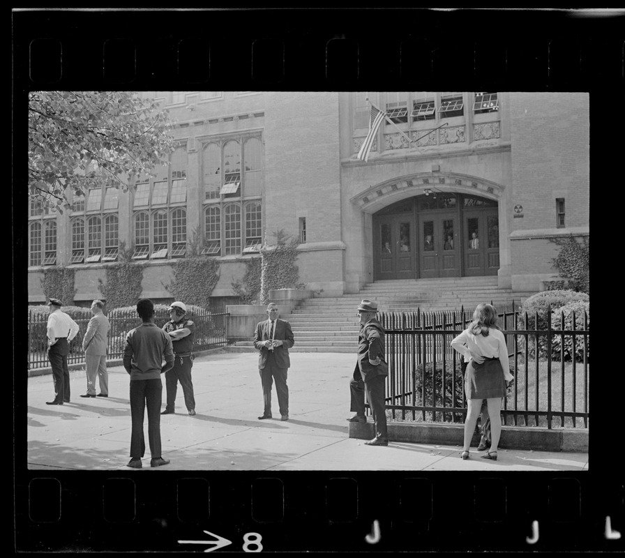 students-and-police-outside-english-high-school-during-demonstration