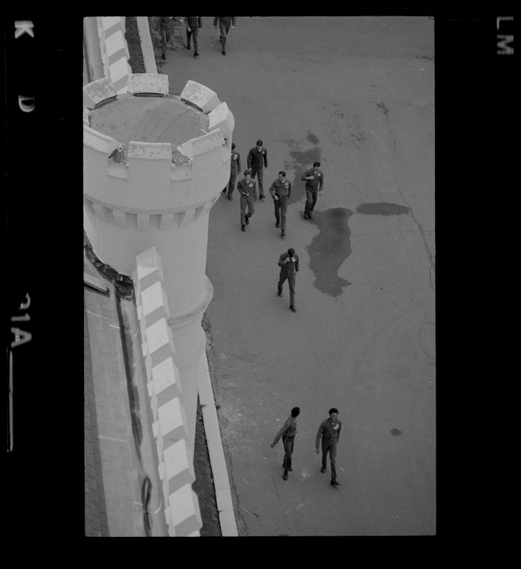 Men walking at Portsmouth Naval Prison