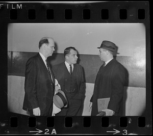 John Asgeirsson, F. Lee Bailey, and Robert Barton conferring outside Massachusetts Supreme Court chambers after hearing about the Boston Strangler