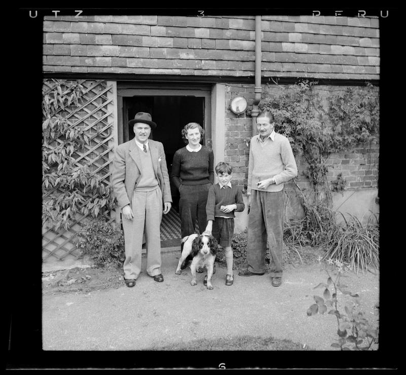 Group in front of house