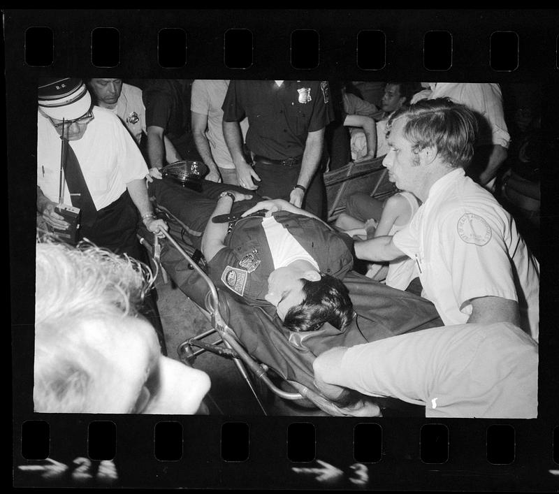 Cop overcome by heat at Boston Garden rock concert, Boston