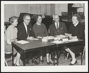 All Newton Music School Board of Trustees' Officers Discuss Plans for New Building Fund Drive to Raise $100,000 for New School Building. Reading left to right, Mrs. Loomis Patrick, Past President, Winslow S. Adams, Vice President, Miss Gretchen Clifford, President, William Clarke Custer, Secretary, and Mrs. Irene K. Thresher, Chairman, New Building Fund Committee.