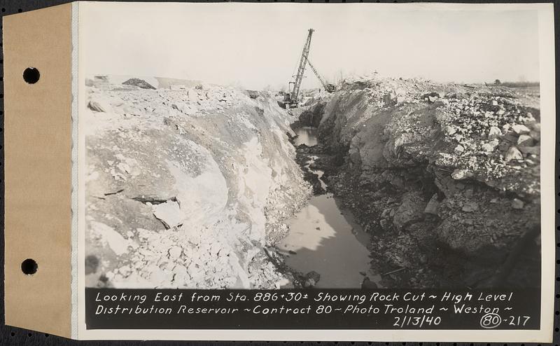 Contract No. 80, High Level Distribution Reservoir, Weston, looking east from Sta. 886+30+/- showing rock cut, high level distribution reservoir, Weston, Mass., Feb. 13, 1940