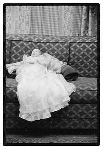 Unidentified baby, possibly in a christening gown