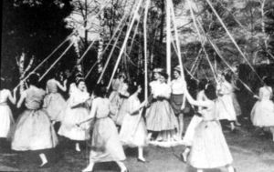 Class of 1958 celebrate May Day with the May Pole Dance, 1956