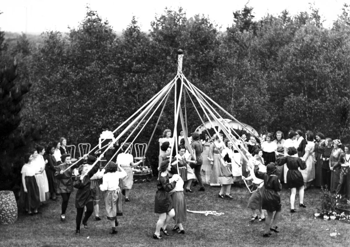 Class of 1946 celebrate May Day with the May Pole Dance, 1948
