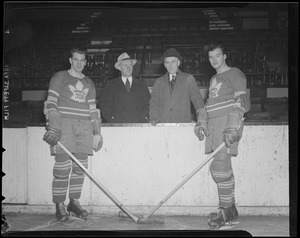 Apps and Drillon of the Maple Leafs with Smythe and Irvin