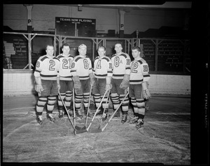 Bruins players pose on ice at the Boston Garden