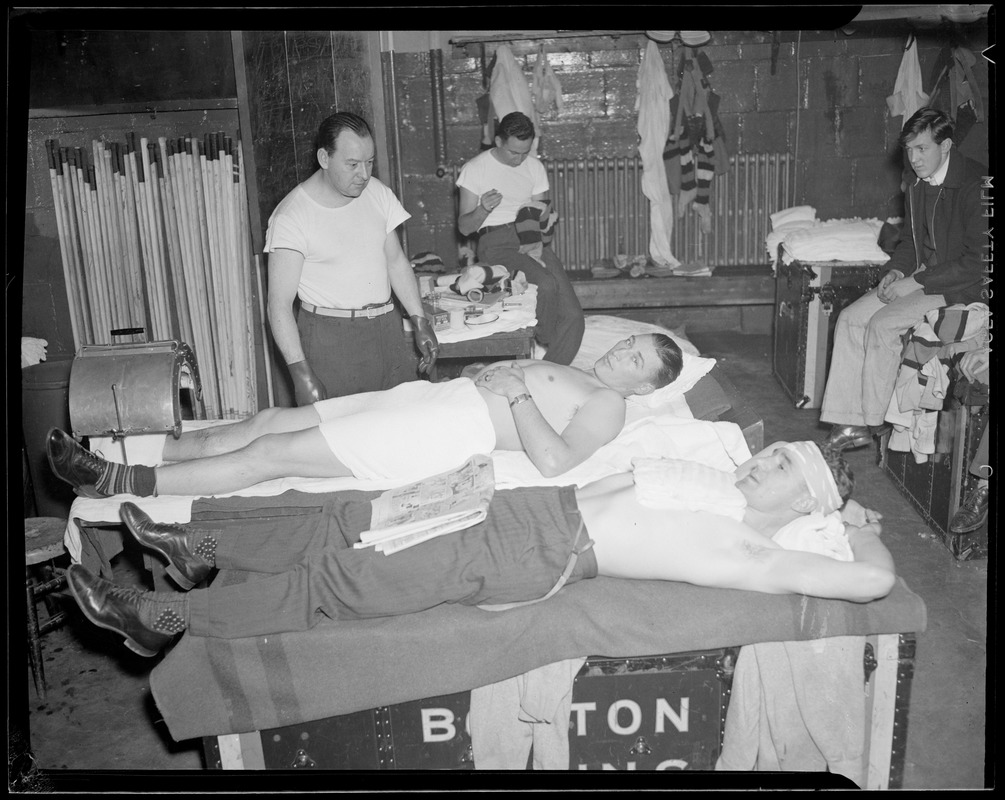 Two Bruins players in Boston Garden locker room Digital Commonwealth