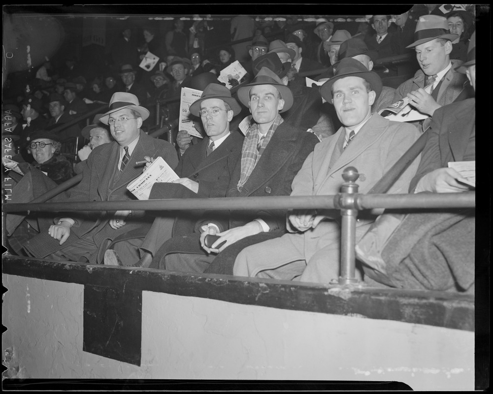 Bruins players sitting in the stands at Boston Garden