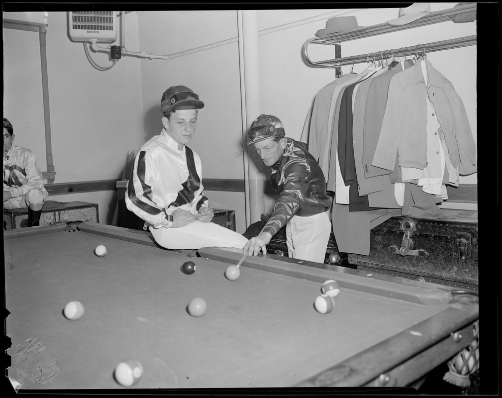 Jockeys shoot pool at Suffolk Downs