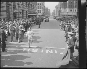 Marathon runner from Greece crosses finish line of B.A.A. Marathon