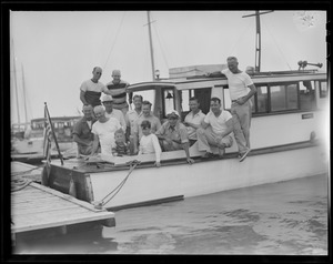 Men on power boat