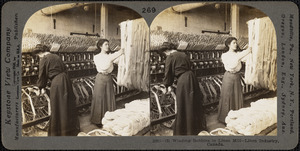 Winding bobbins in a linen mill.