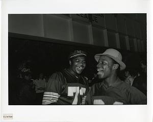 Two students smiling