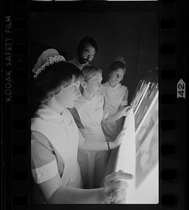 Mass. General Hospital student nurses, doc & instructor check x-rays, Boston