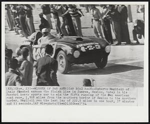 Winner of Pan American Road Race -- Umberto Maglioli of Italy flashed across the finish line in Juarez, Mexico, today in his Ferrari heavy sports car to win the fifth running of the Pan American road race, 1908 miles from the southern border of Mexico to the northern border. Maglioli ran the last lap of 222.5 miles in one hour, 37 minutes and 53 seconds.