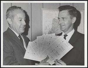 Two unidentified men hold tickets to the 1967 World Series