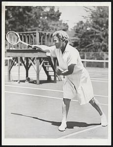 Former Tennis Champ Now Instructing Coral Gables, Fla. -- Miss Elizabeth Ryan, winner of nineteen Wimbledon championships, un unequalled record, who has been appointed tennis instructor at the Miami Biltmore Hotel here for the new season starting early in December. Miss Ryan decided to teach the game in 1935 and went abroad to study with the great tennis teachers of England and Europe. She has had great success in developing championship players.